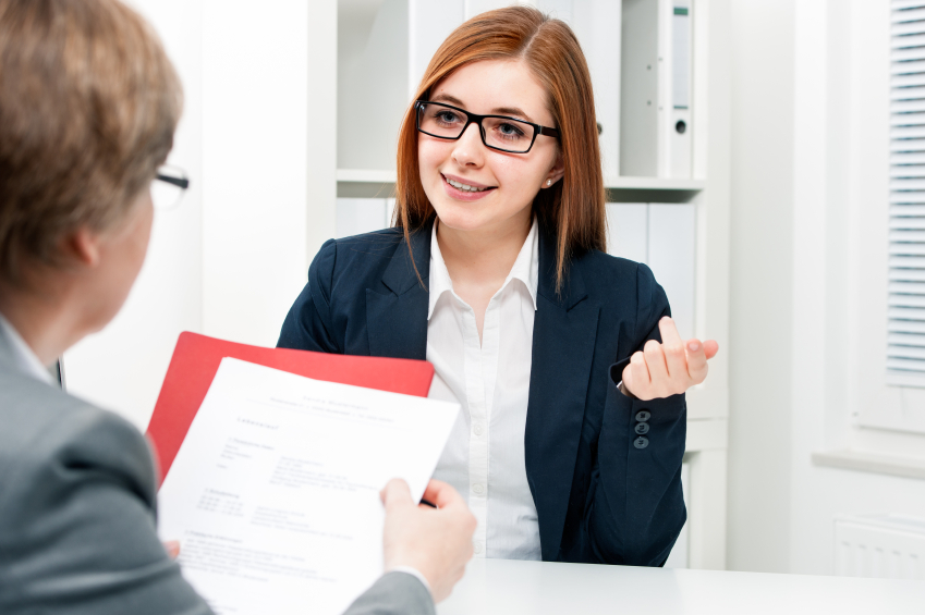 Young woman discussing during a job interview at office