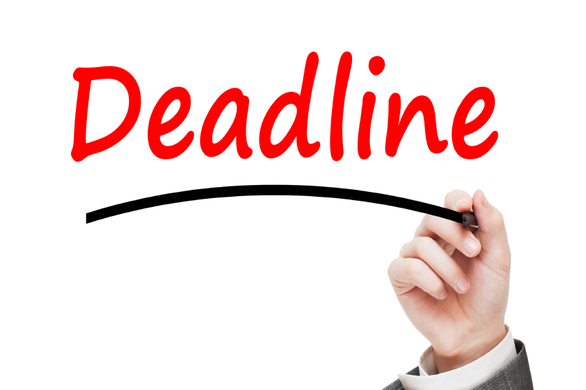 Man writing Deadline Concept with red marker isolated on white b